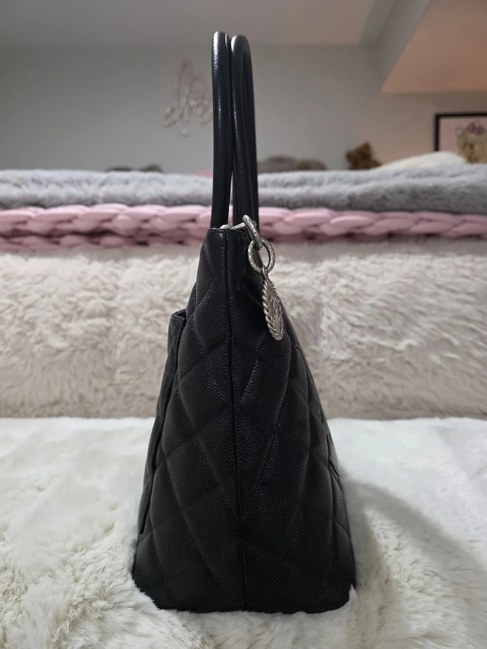 100% Authentic Black Cavier Medallion tote with silver coin charm